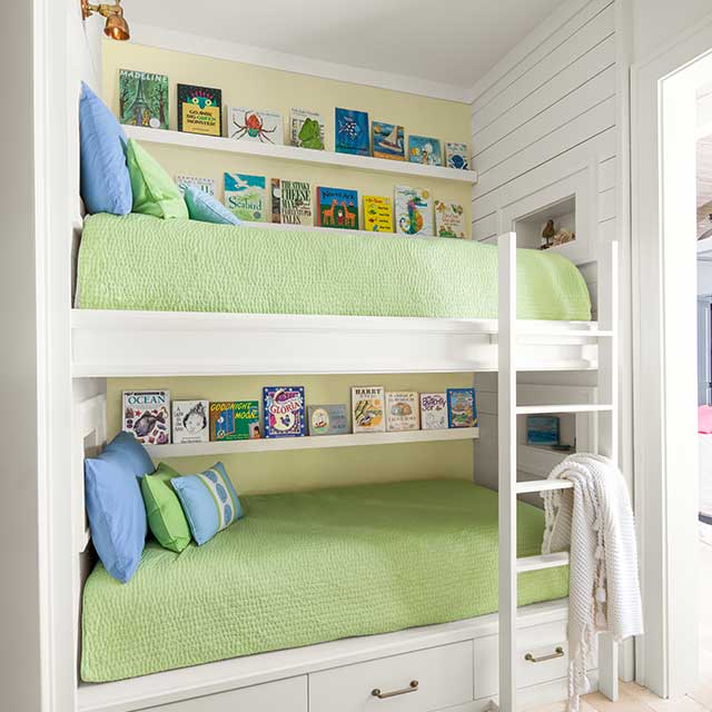 A relaxing bedroom with bunkbeds using a yellow, yellow-green and green analogous colour scheme.