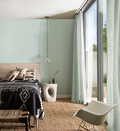 Southwest-inspired bedroom with Palladian Blue walls and Atrium White ceiling.