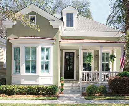 Green home exterior painted with Coronado Cryli Cote®
