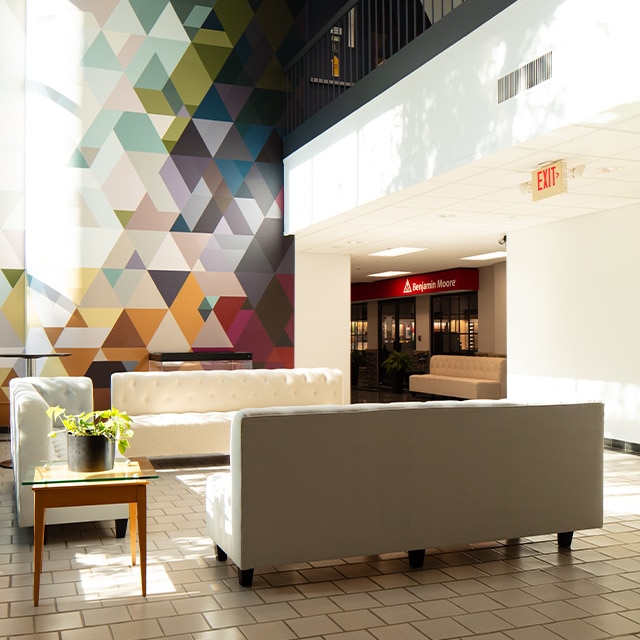 The Benjamin Moore Montvale office lobby with a geometric multi-colored accent wall.