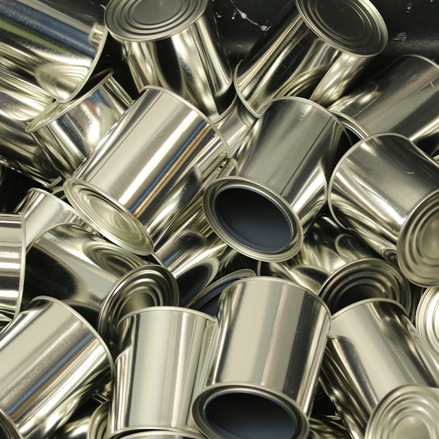 A pile of empty cans to be recycled.