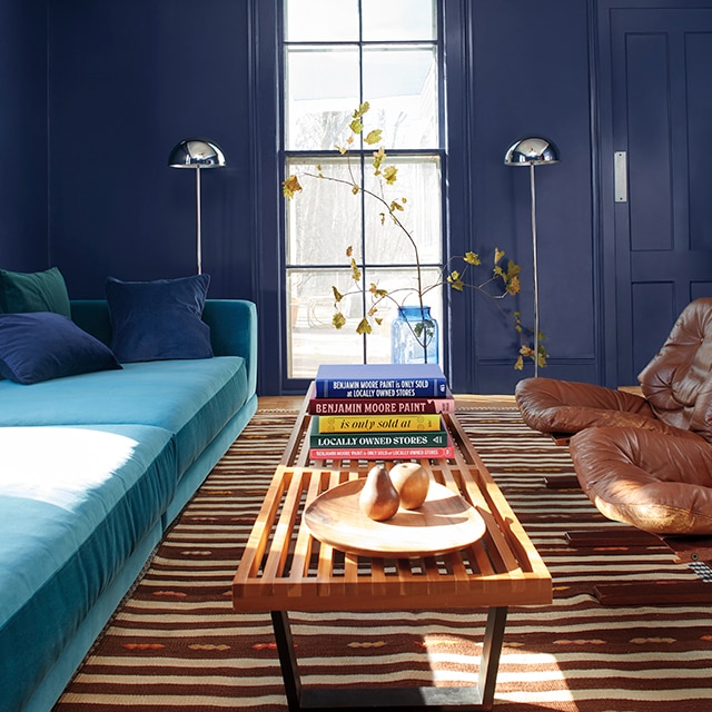 Premium Photo  Home interior blue with sofa and terracotta walls