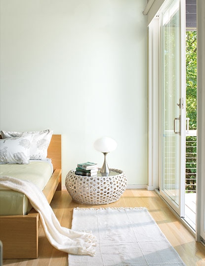 Crisp, light green bedroom retreat
