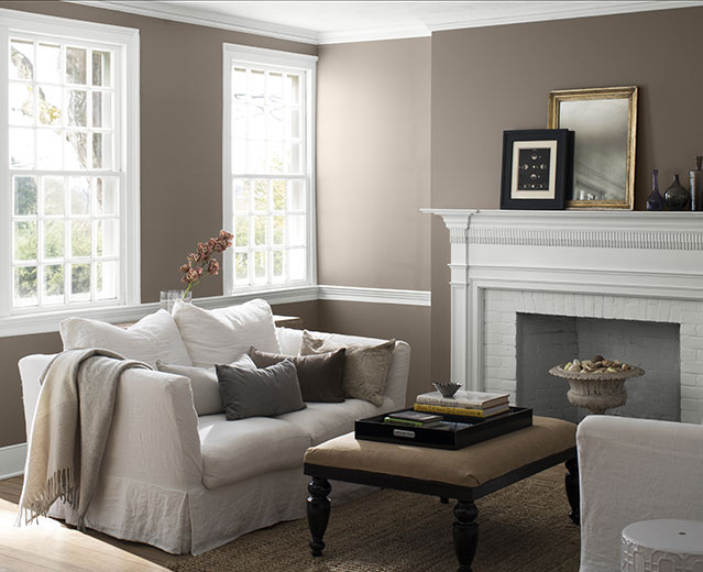 A living room painted in warm Stardust 2109-40 to show the impact of warm paint colors.